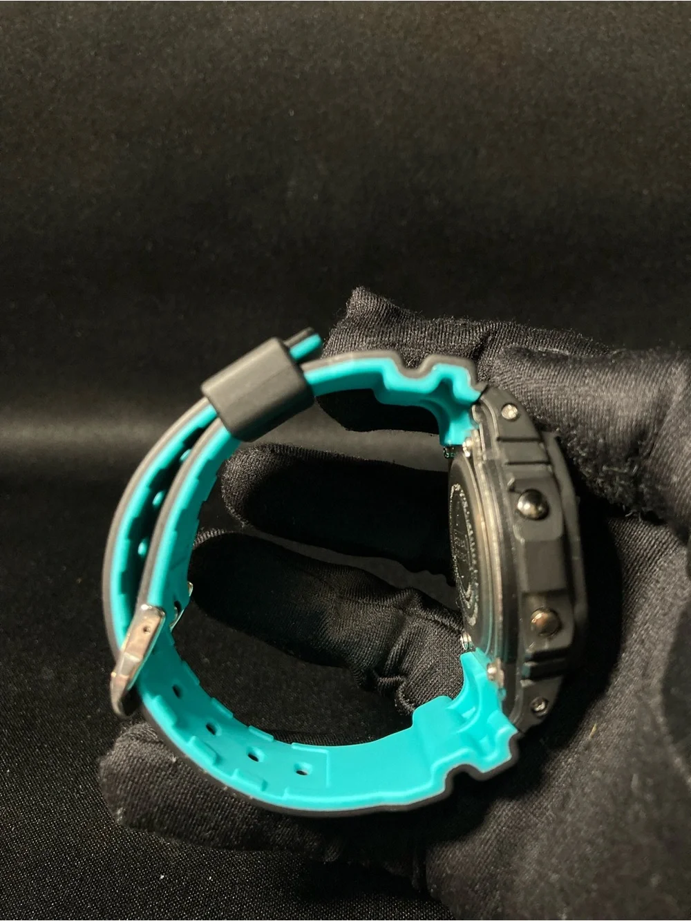 Teal and Black G Shock Dw5600
